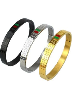 Gucci-style stainless steel bangles*, known for their sleek, modern design with a signature red-green stripe.